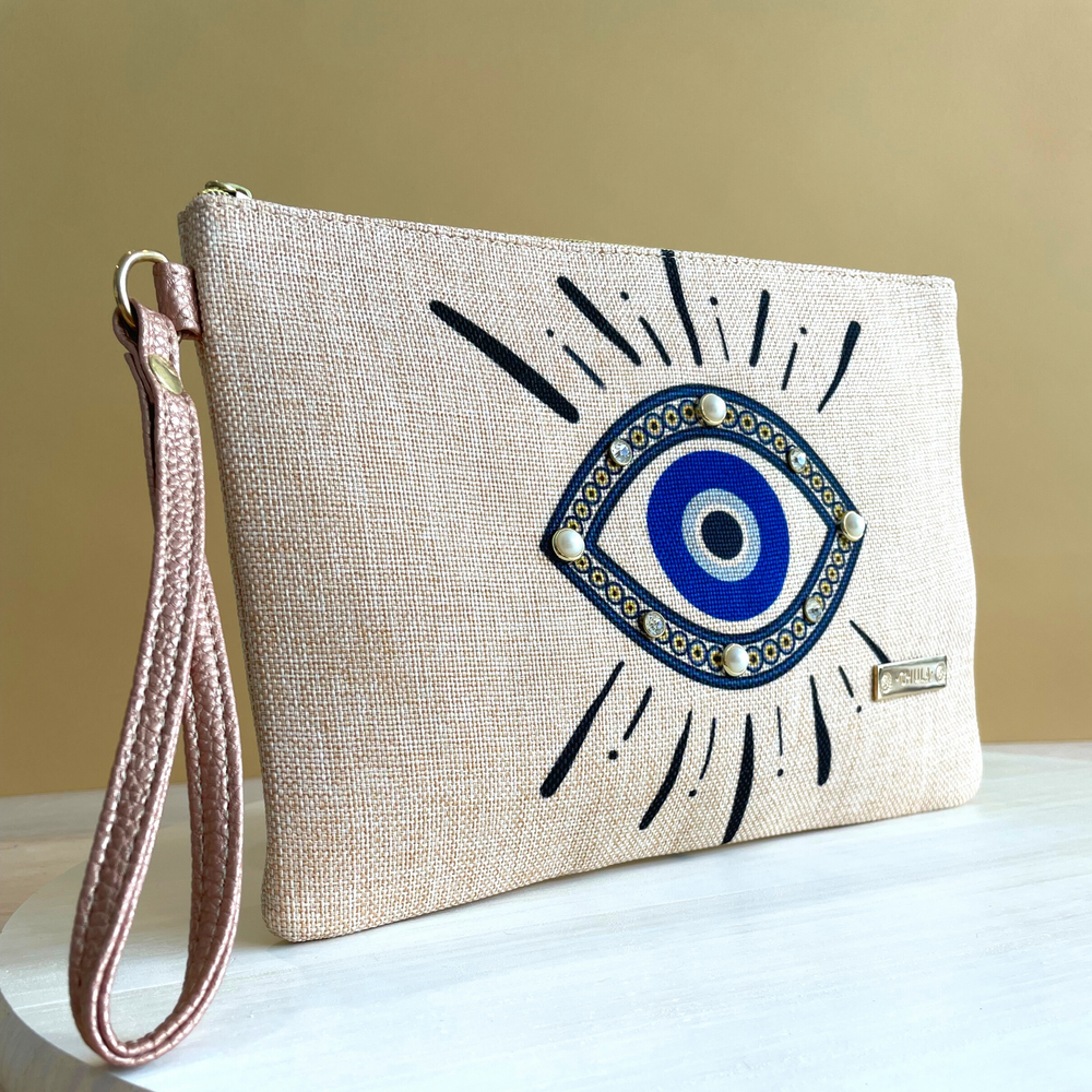 
            
                Load image into Gallery viewer, Ojo Turco Canvas Clutch
            
        